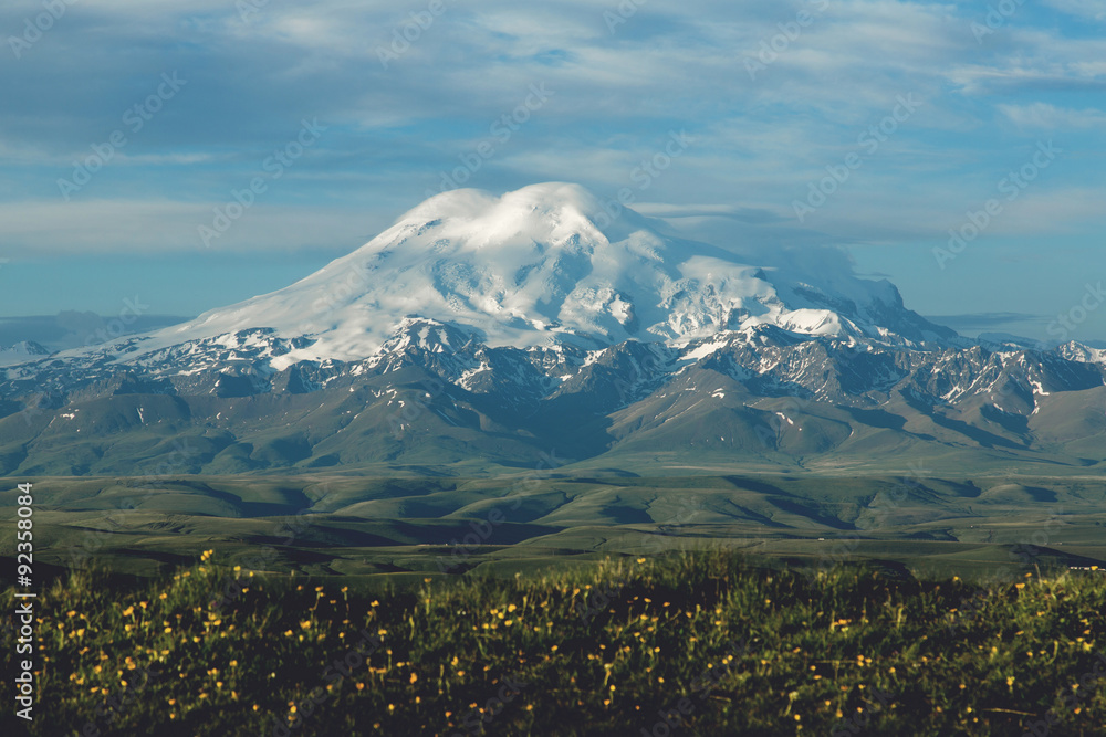 Fototapeta premium Mount Elbrus in the morning rays of the sun
