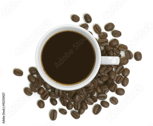 coffe cup with coffee beans around 
