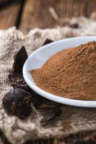 Cola Nut Powder on wooden background
