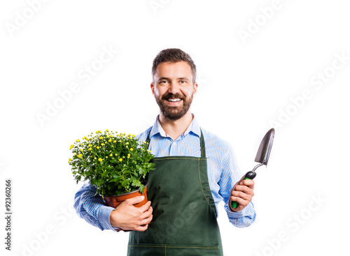 Young handsome gardener