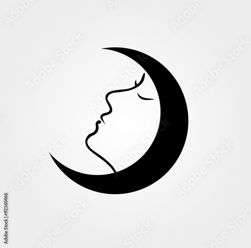 Woman f ace inside a moon with her eyes closed