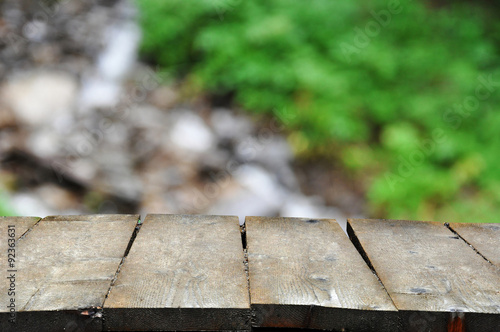 Old wooden table with natural background