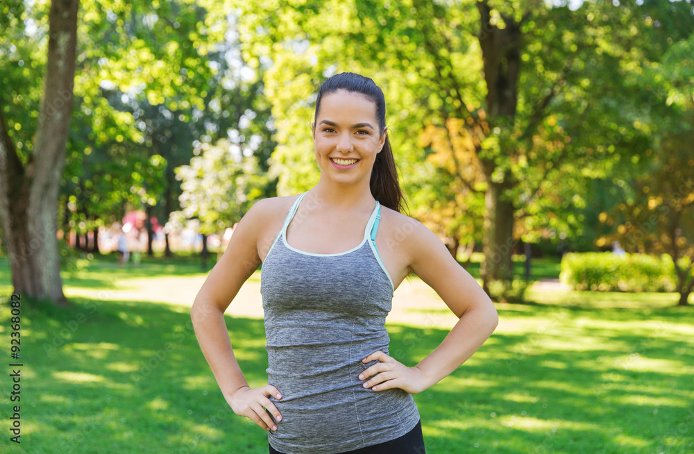 happy young woman exercising outdoors happy young woman exercising outdoors