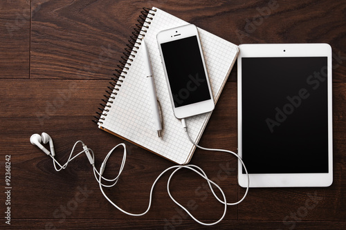 Smartphone and tablet with earphones