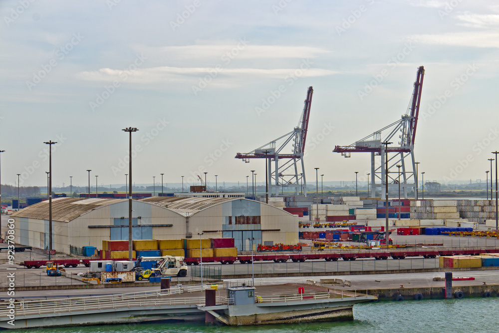 Fototapeta premium Maritime port with loading cranes and containers