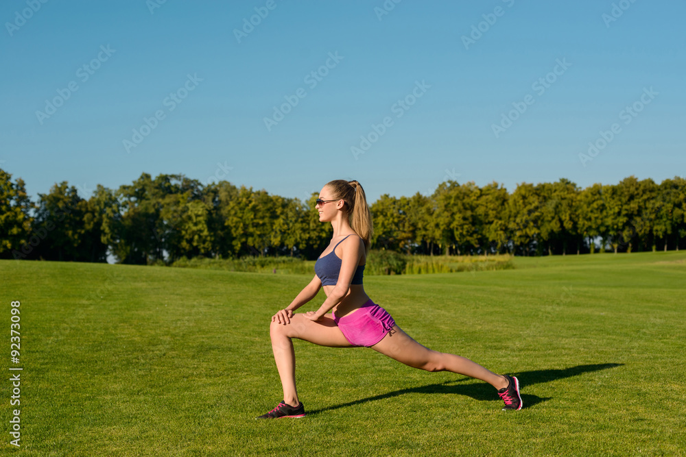 Sports trainer show the exercises.