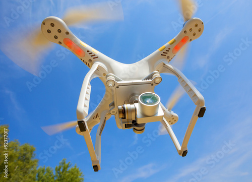 Drone quadrocopter with high resolution digital camera. New tool for aerial photo and video. 