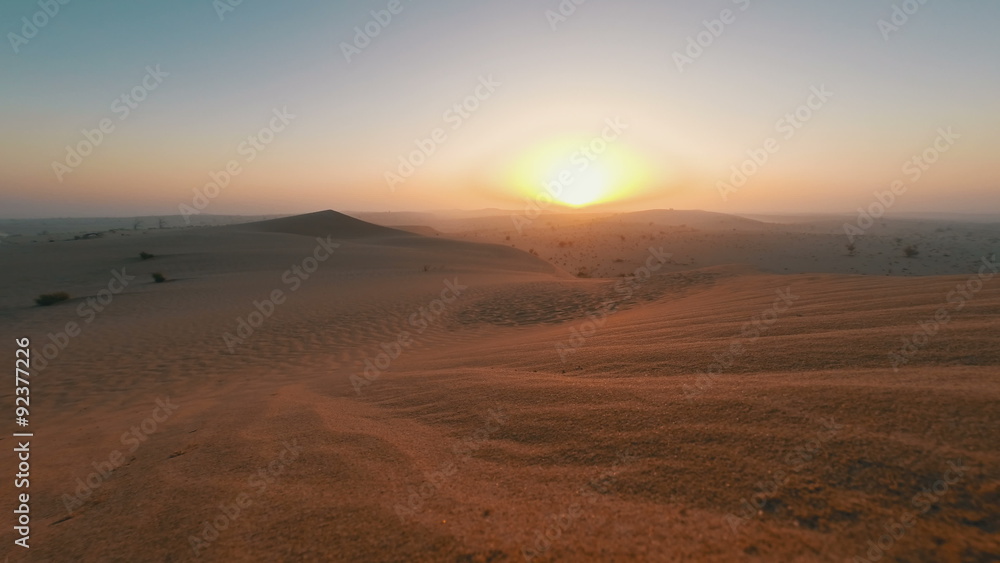 Sunrise over dunes in the Arabian desert timelapse Sunrise over dunes in the Arabian desert timelapse