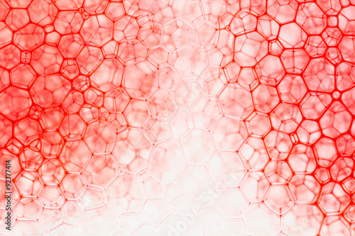 Canvas Print Abstract geometric pattern when ink flowing through soap bubbles against glass