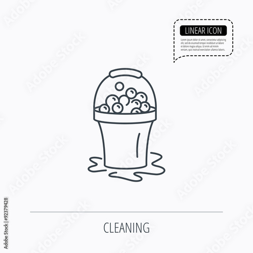 Soapy cleaning icon. Bucket with foam and bubble