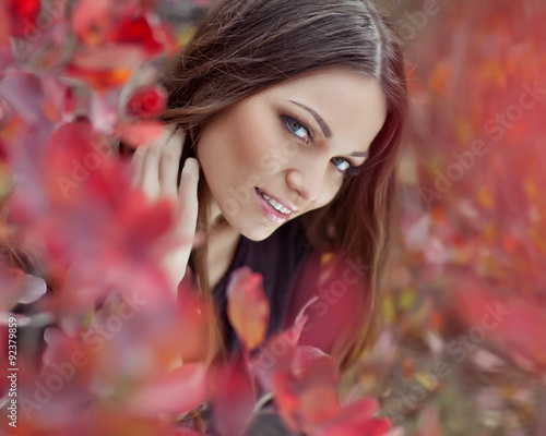 woman in autumn forest 