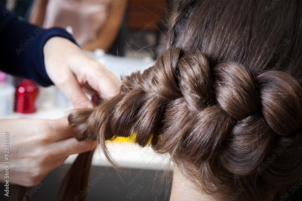 Fototapeta premium weave braids in hairdressing salon