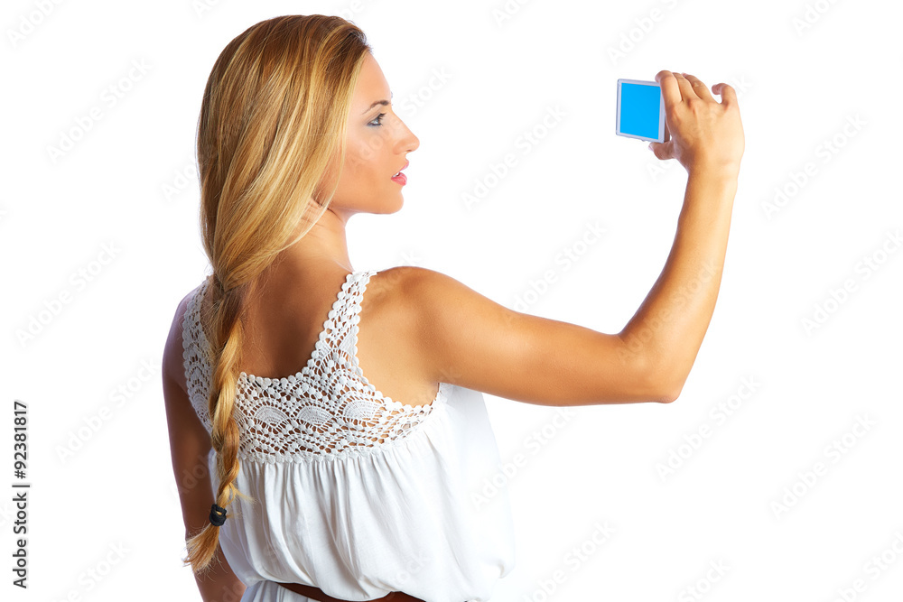 Blond tourist girl taking photos with smartphone Blond tourist girl taking photos with smartphone