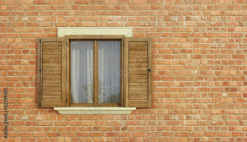 Detail of an old house with brick wall