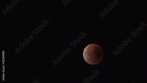 Blutmond während einer totalen Mondfinsternis photo