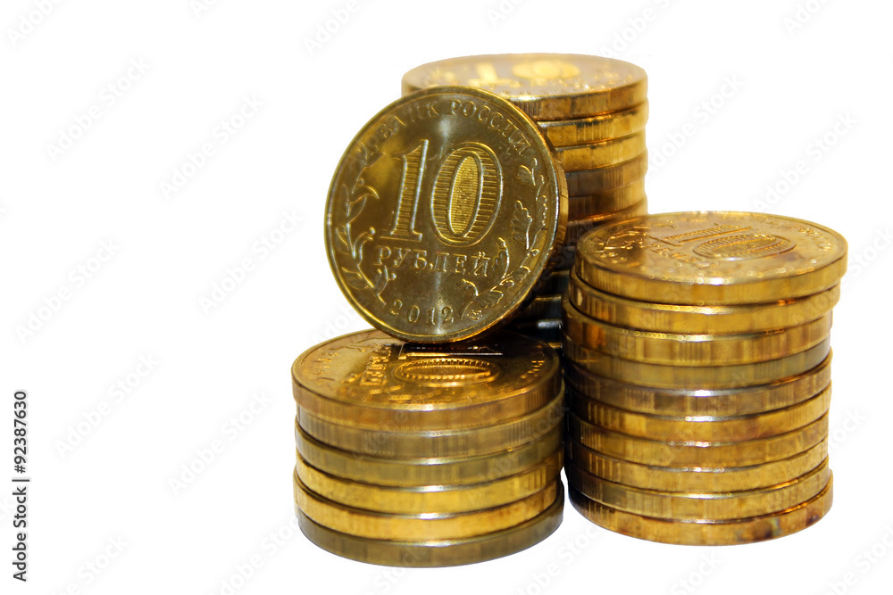 Close up of golden coins isolated on white background.Russian metallic roubles. Close up of golden coins isolated on white background.Russian metallic roubles.