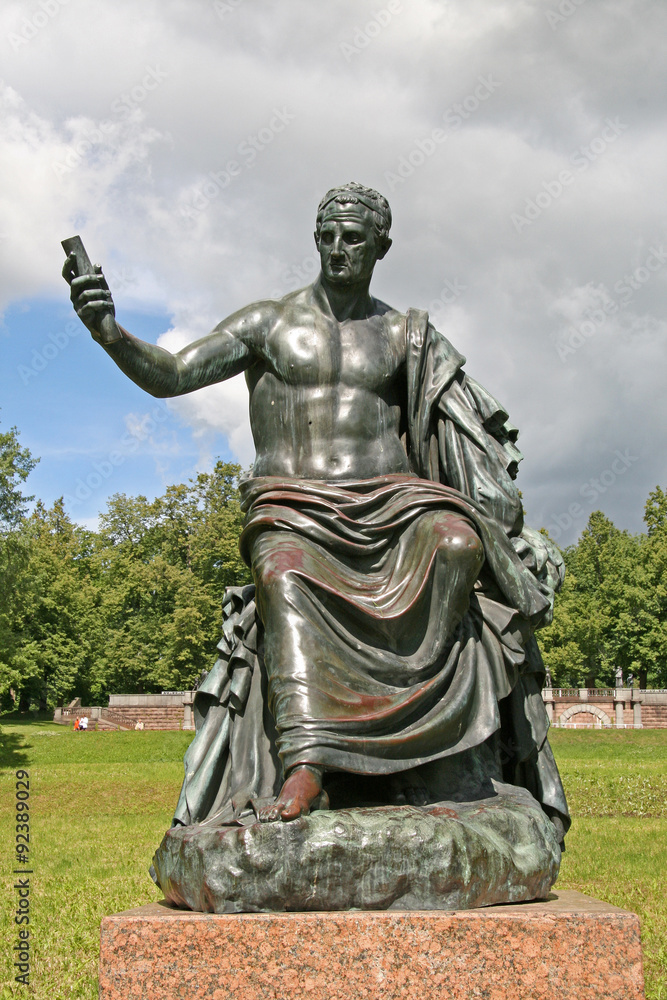 Fototapeta premium ST. PETERSBURG, TSARSKOYE SELO, RUSSIA - JUNE 26, 2008: The Roman Emperor Nerva Sculpture in front of a Granite terrace