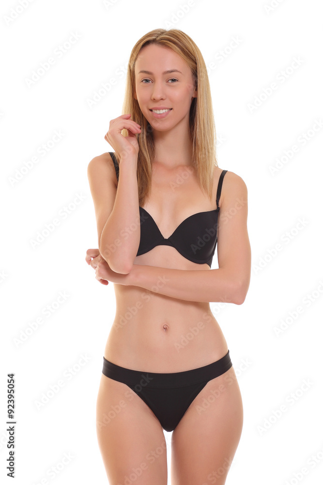 Obraz premium young blond woman posing in black lingerie.