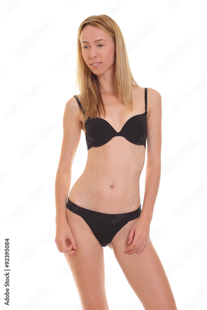 Fototapeta premium young blond woman posing in black lingerie.