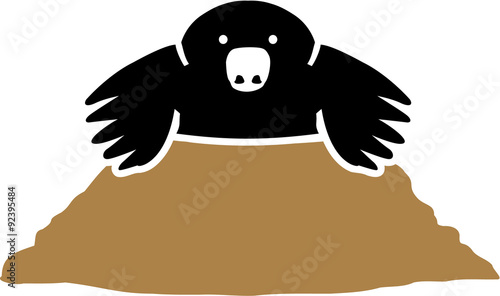 Mole sitting in a hole
