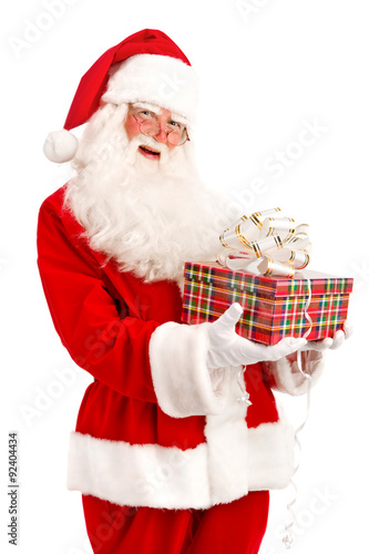 Santa Holding Christmas Present in his Hands on a White Backgrou