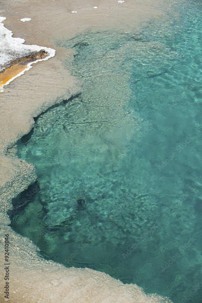 Clear, aqua, hot spring water in Yellowstone National Park, Wyom