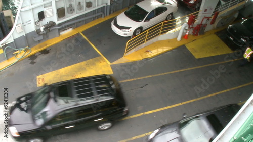Automobiles disembark ferry