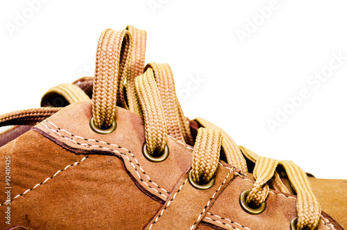 close-up picture of a pair of male's shoes white background