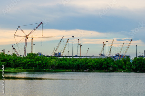 Sunset view with construction cranes at Laemchabang Port.  photo