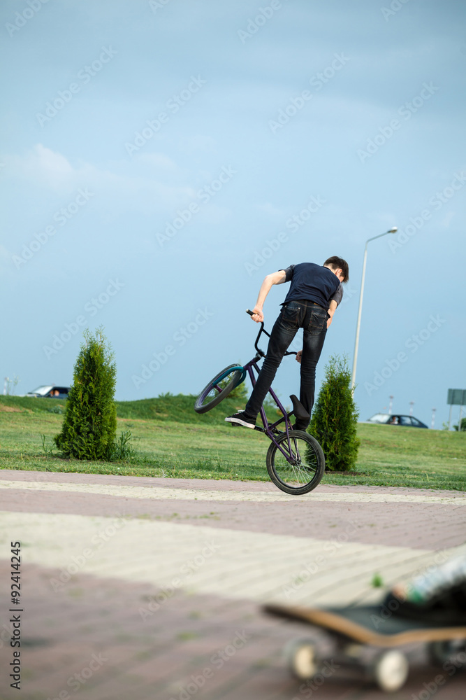 teenager on a bicycle