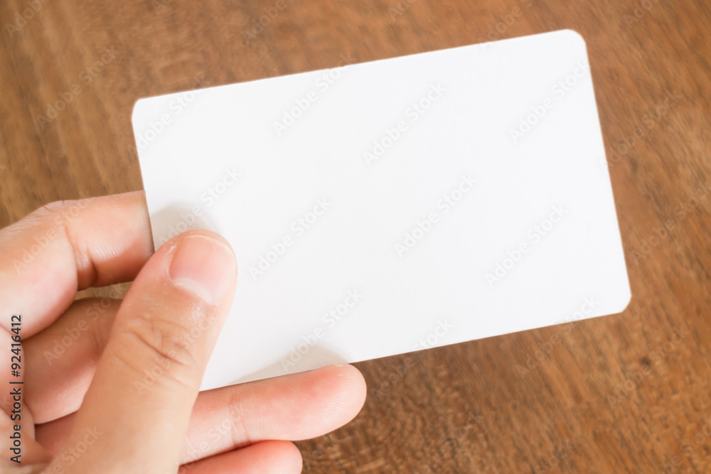 Obraz premium Hand holding a business card