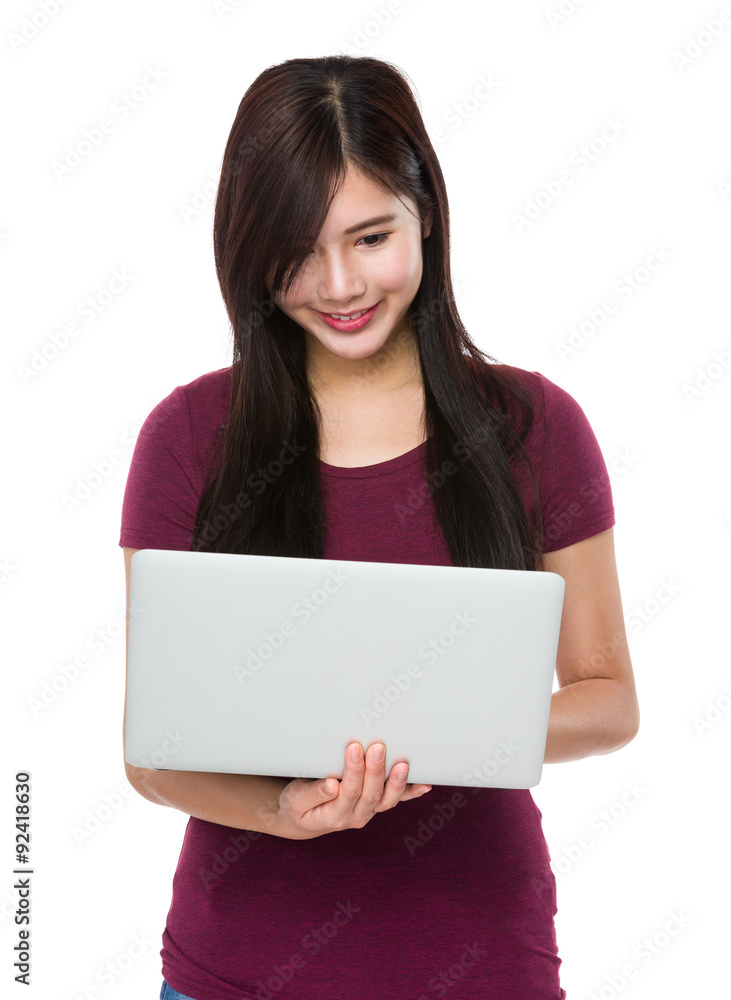 Young woman read on the notebook computer Young woman read on the notebook computer