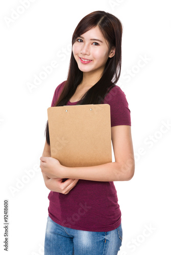 Young asian woman hold with file board
