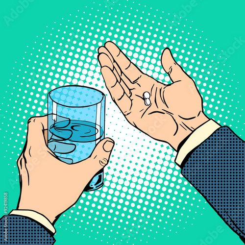 Medication health pills in hand