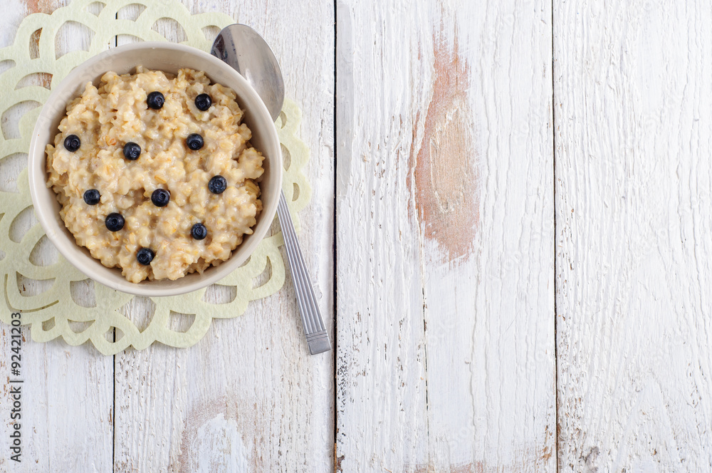 Oatmeal porridge for breakfast, top view