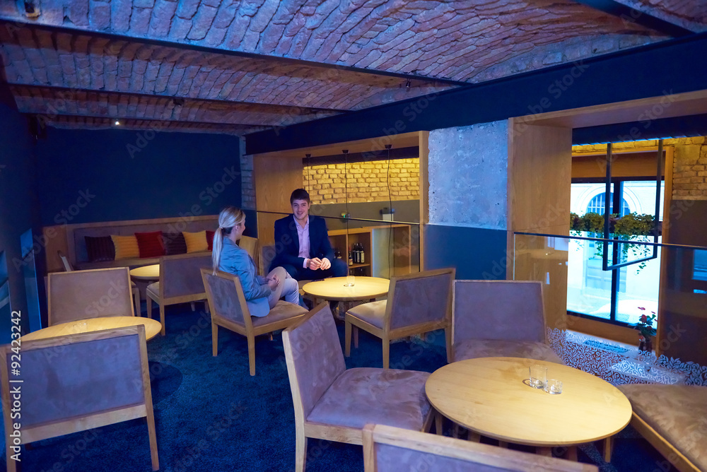 Fototapeta premium business couple take drink after work