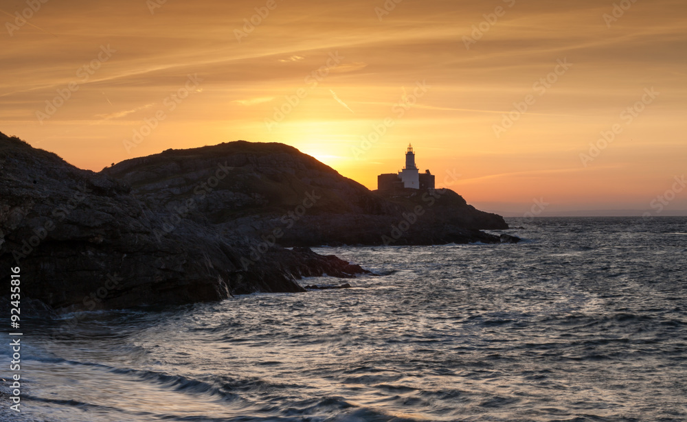 Dawn at Mumbles Lighthouse, Swansea, shot from Bracelet Bay.