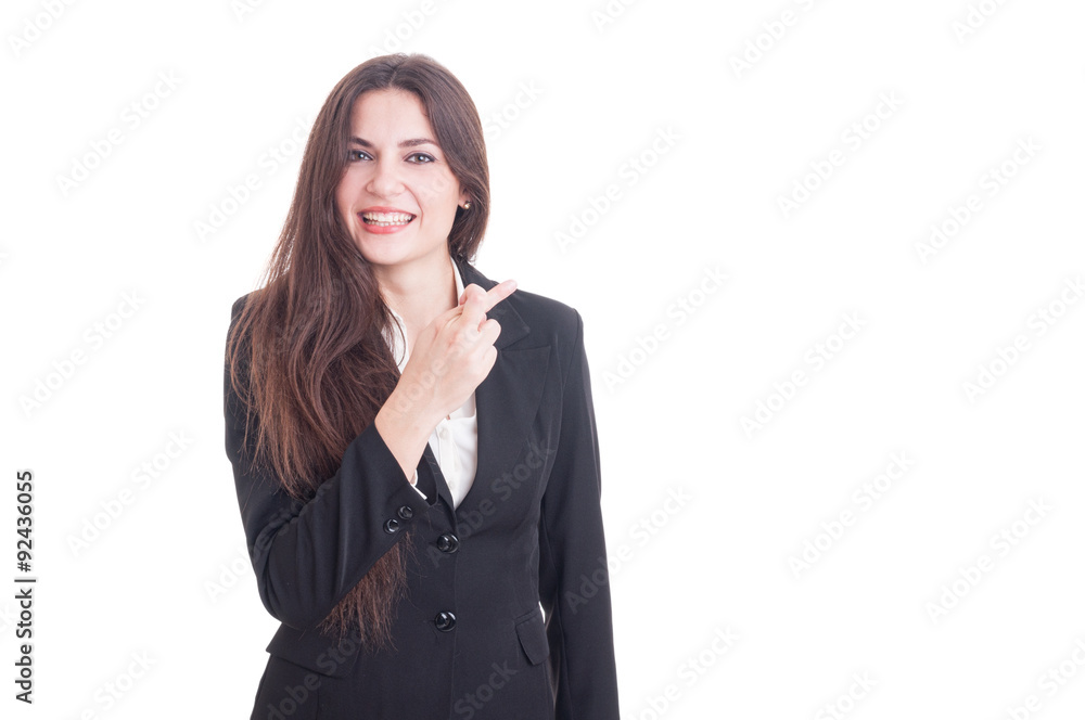 Successful business woman making good luck gesture by crossing f Successful business woman making good luck gesture by crossing f
