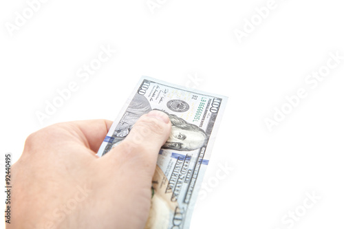 Hand out hundred dollar note. All on white background
