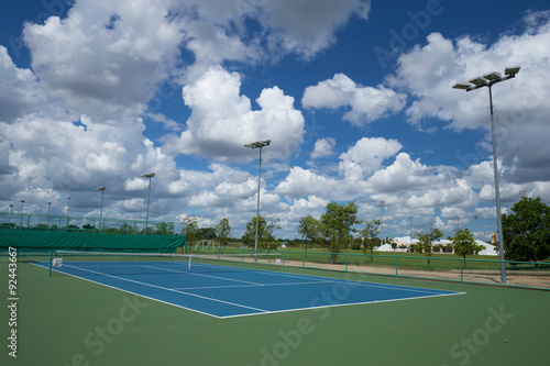 outdoor empty tennis court with blue sky © geargodz