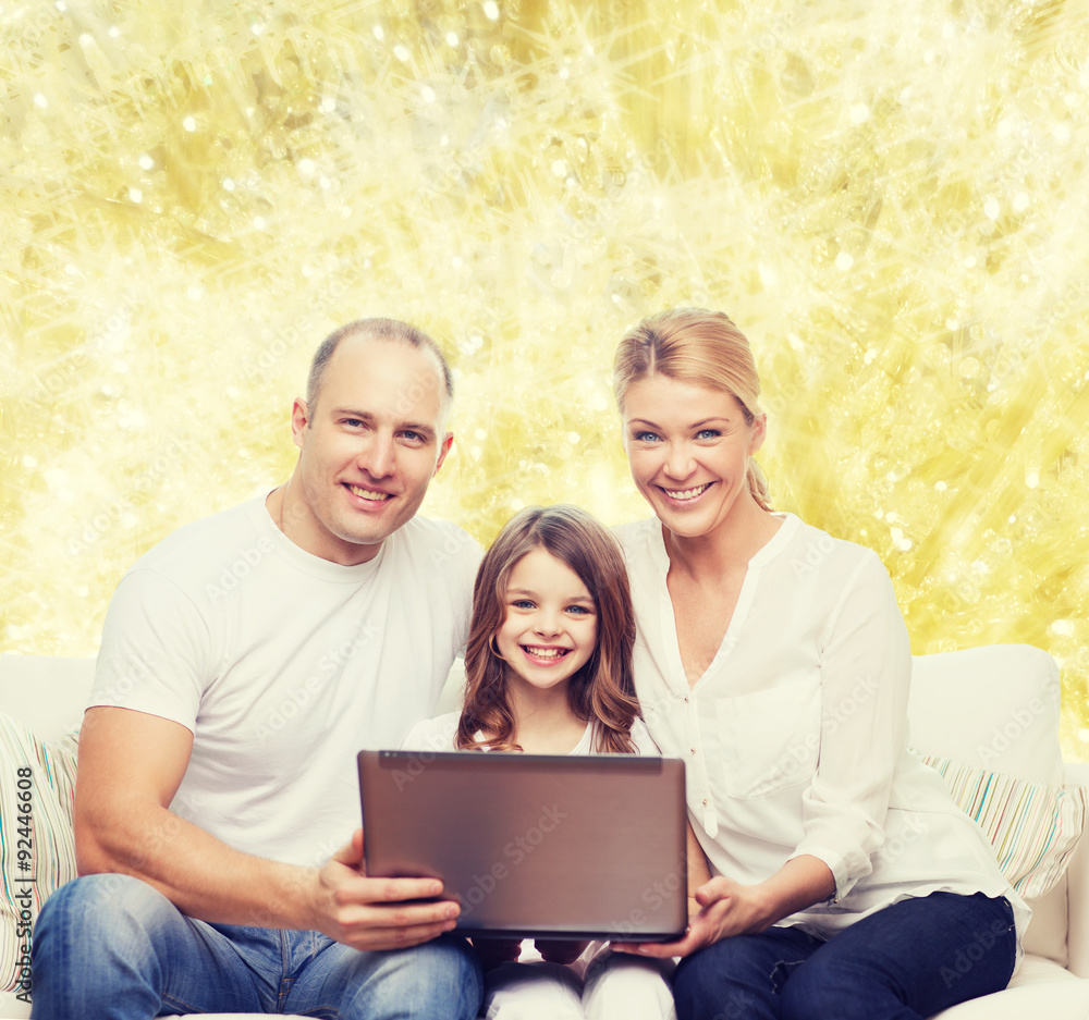 smiling family with laptop smiling family with laptop