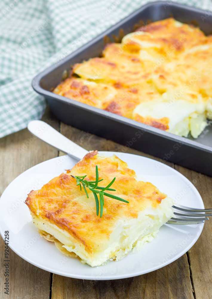 Potato gratin on a white plate