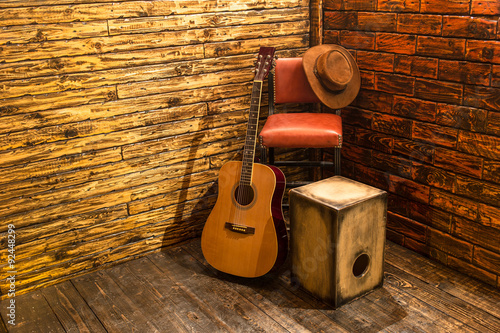 Music instruments on wooden stage photo