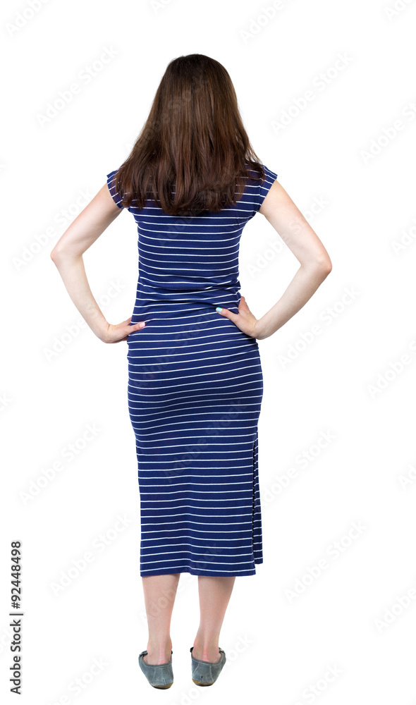 back view of standing young beautiful woman. back view of standing young beautiful woman.