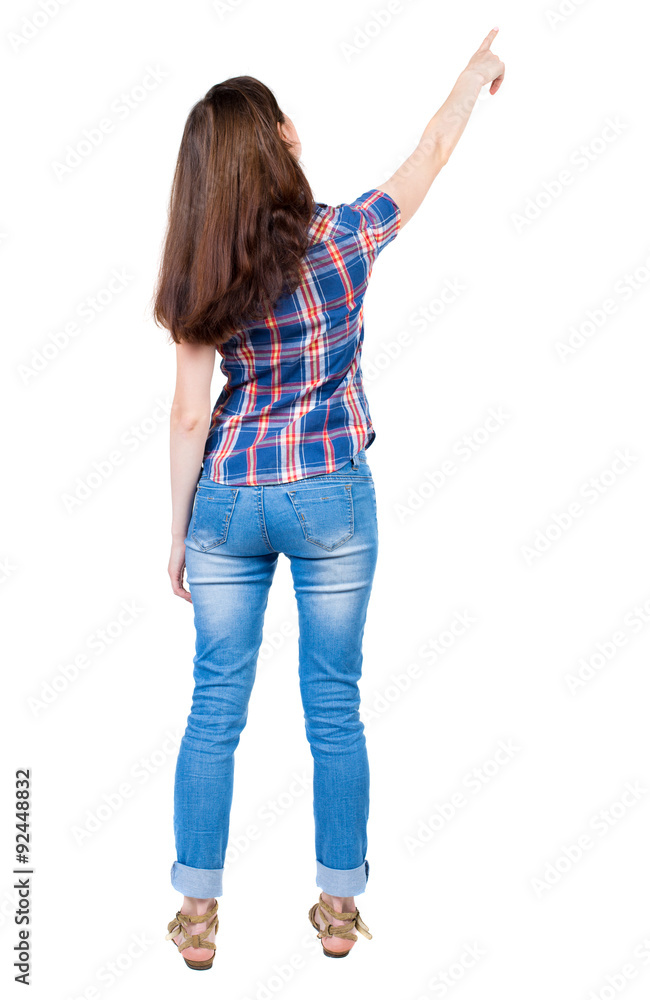 Back view of pointing woman. beautiful girl. Back view of pointing woman. beautiful girl.