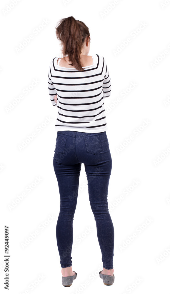 back view of standing young beautiful woman. back view of standing young beautiful woman.