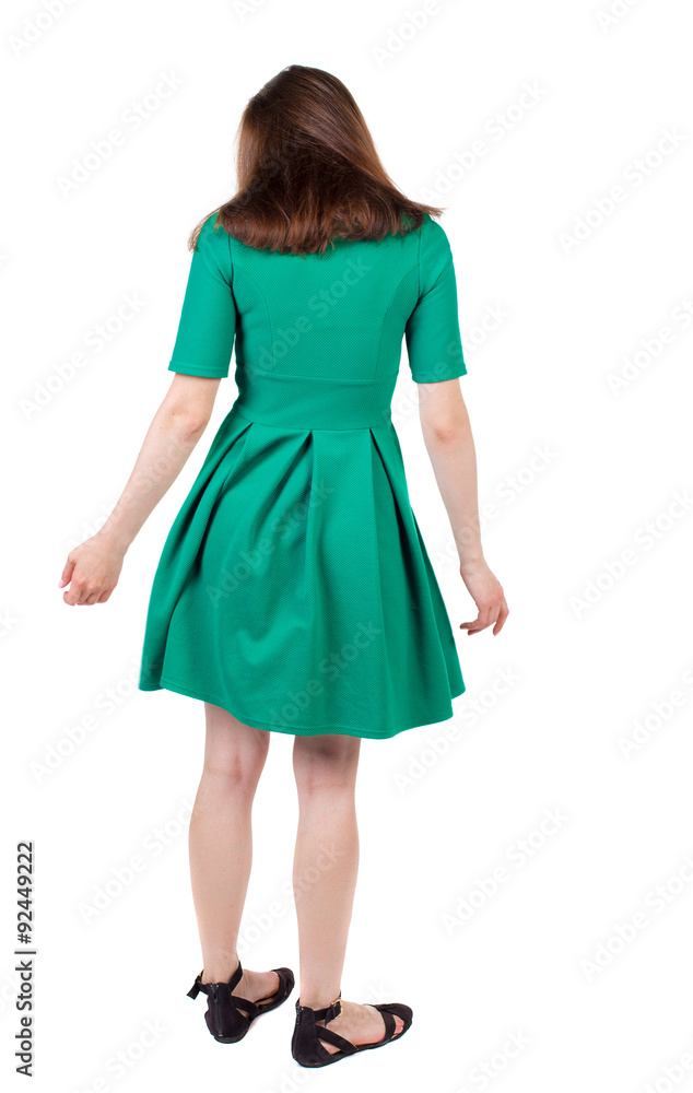 back view of young beautiful girl standing in thoughtful pose. back view of young beautiful girl standing in thoughtful pose.