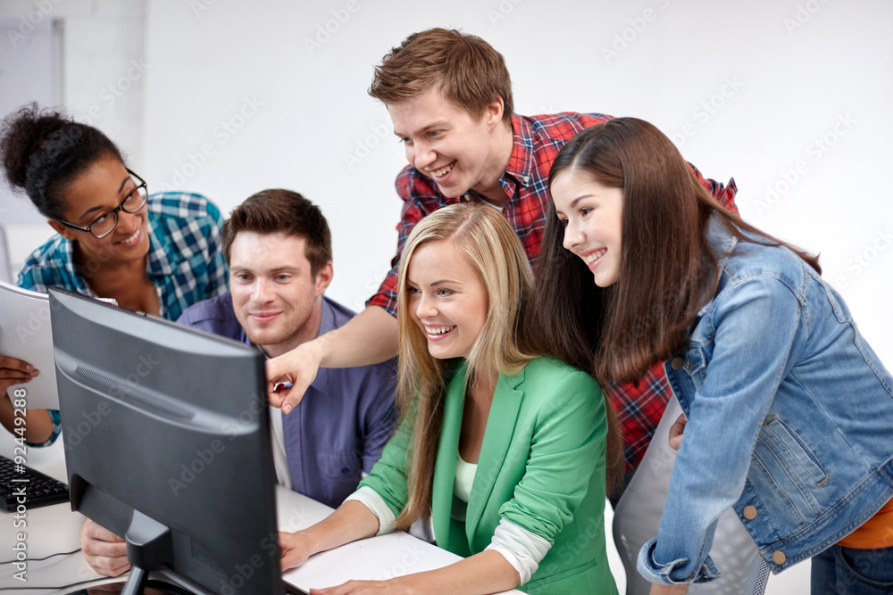 happy high school students in computer class happy high school students in computer class