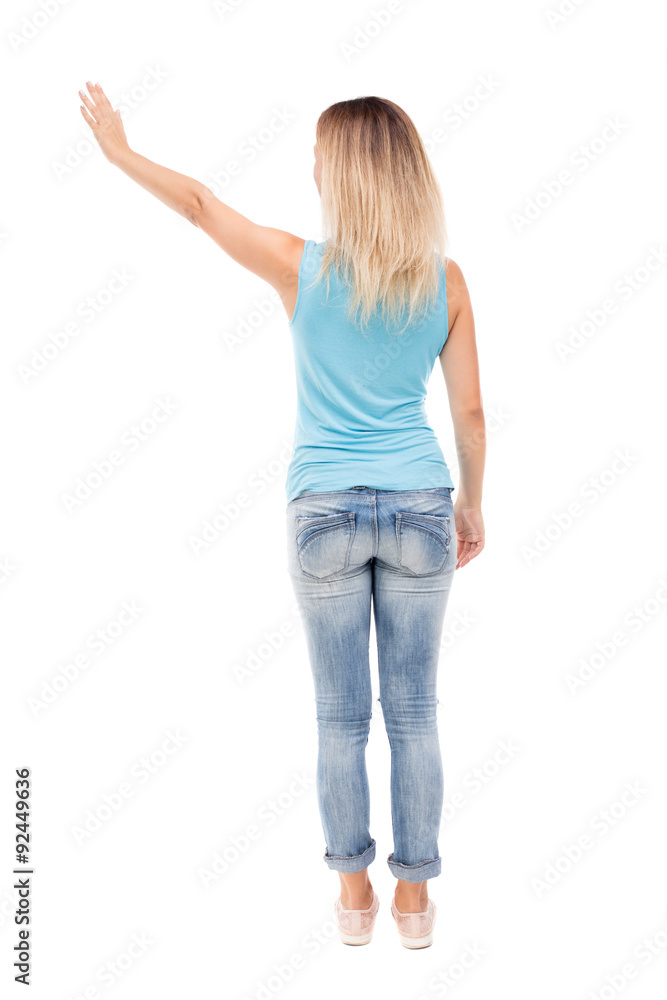 Back view of beautiful woman welcomes. Back view of beautiful woman welcomes.
