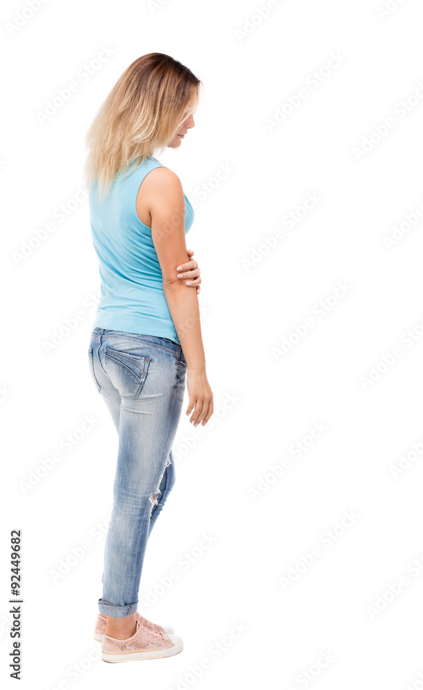 back view of standing young beautiful woman. back view of standing young beautiful woman.